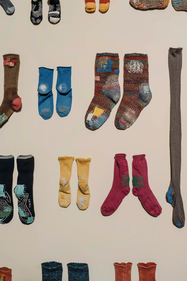 SOCKS: IMAGINATIVE MENDING by Celia Pym