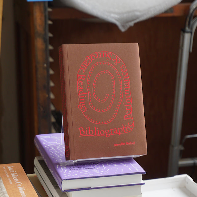 BIBLIOGRAPHIC PERFORMANCES & SURROGATE READINGS by Janelle Rebel