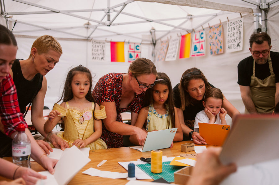 A bookbinding workshop for families at the V&A Celebration of Making, 2019.